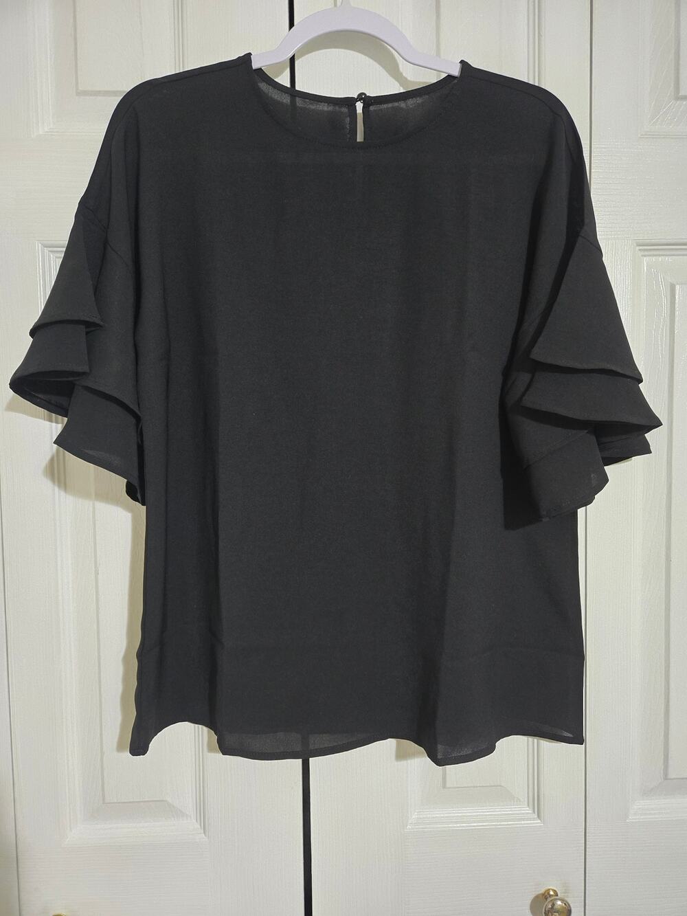 Unknown brand medium women's Ruffle sleeves black blouse